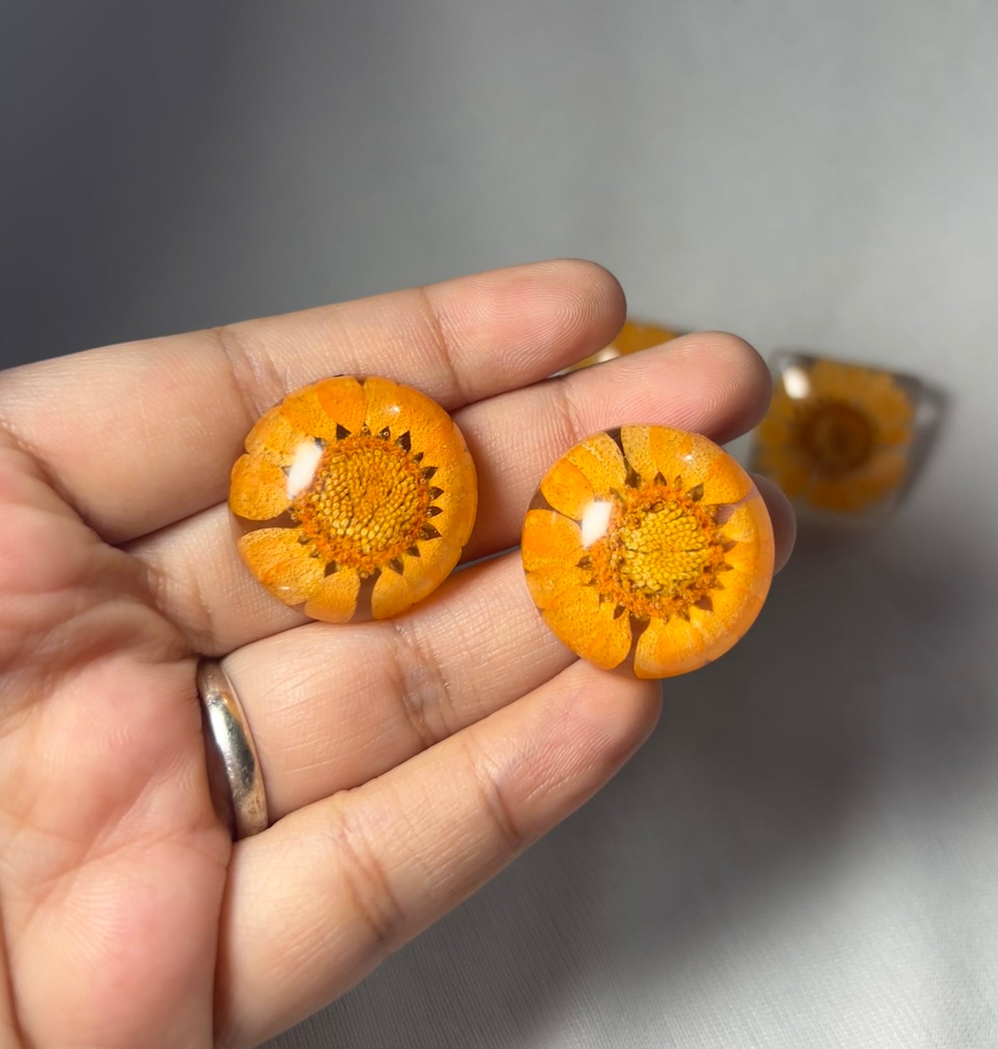 THE ORANGY FLORAL studs