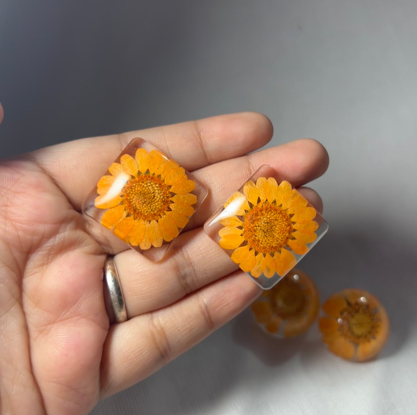 THE ORANGY FLORAL studs