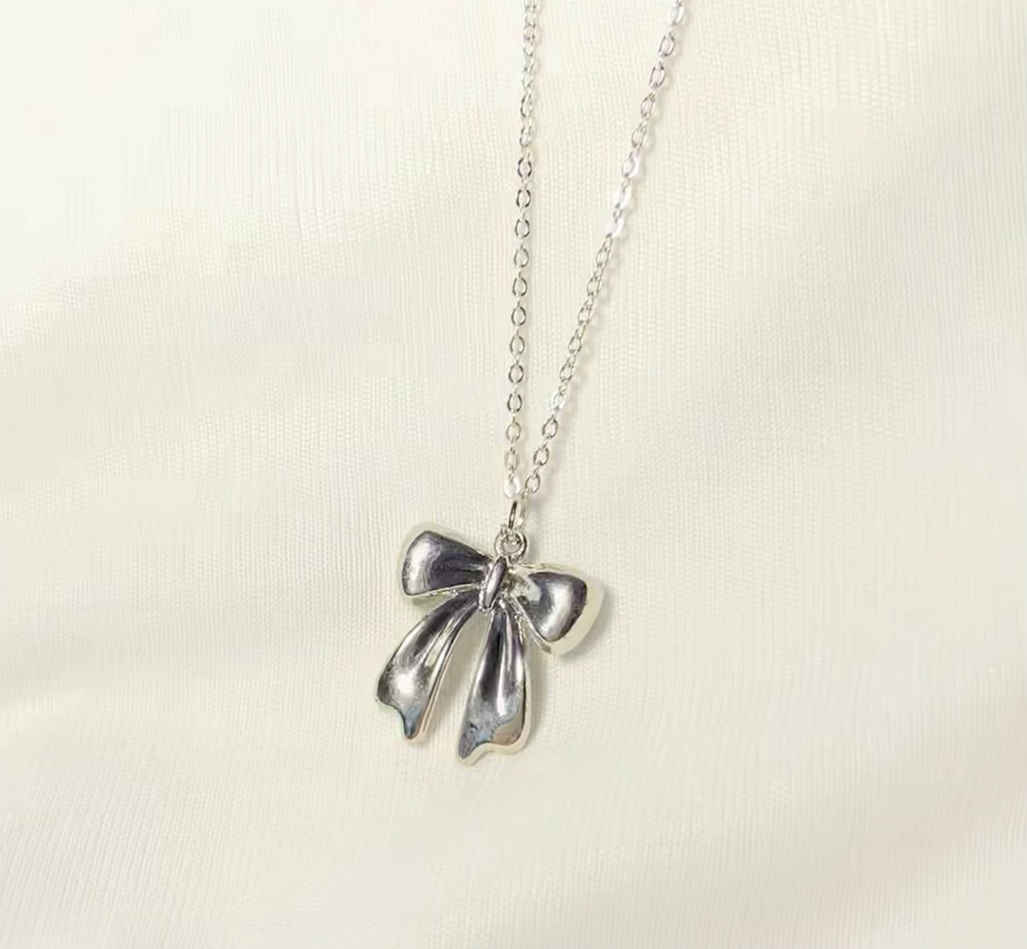 THE SOFIA BOW neckpiece