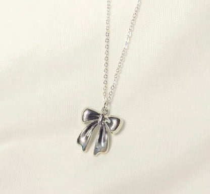 THE SOFIA BOW neckpiece