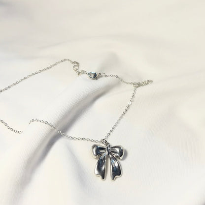 THE SOFIA BOW neckpiece