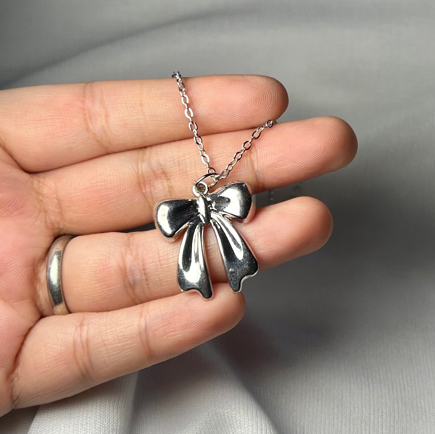 THE SOFIA BOW neckpiece